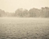 Photo winter snowstorm over lake white blue gray snowfall in water fine art