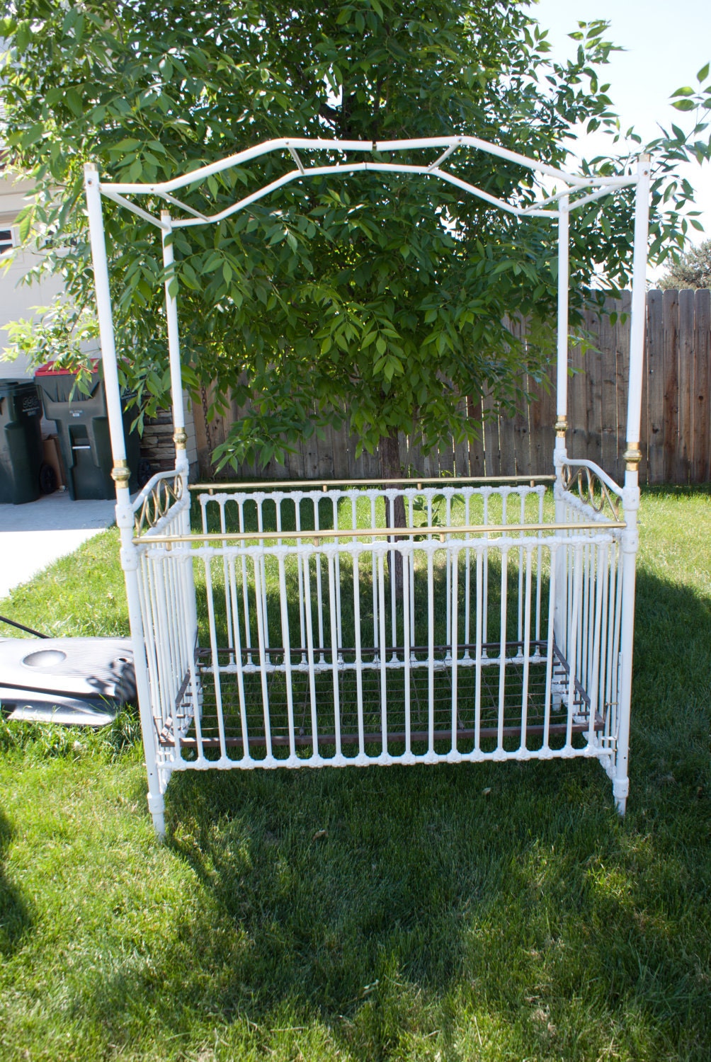 Vintage cast iron canopy crib