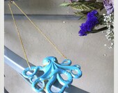 Aqua Blue Faux Patina Brass Octopus Pendant on a gold finished brass chain