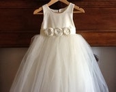 Flower girl dress , cotton, silk or satin with 3 layers of soft tulle over skirt