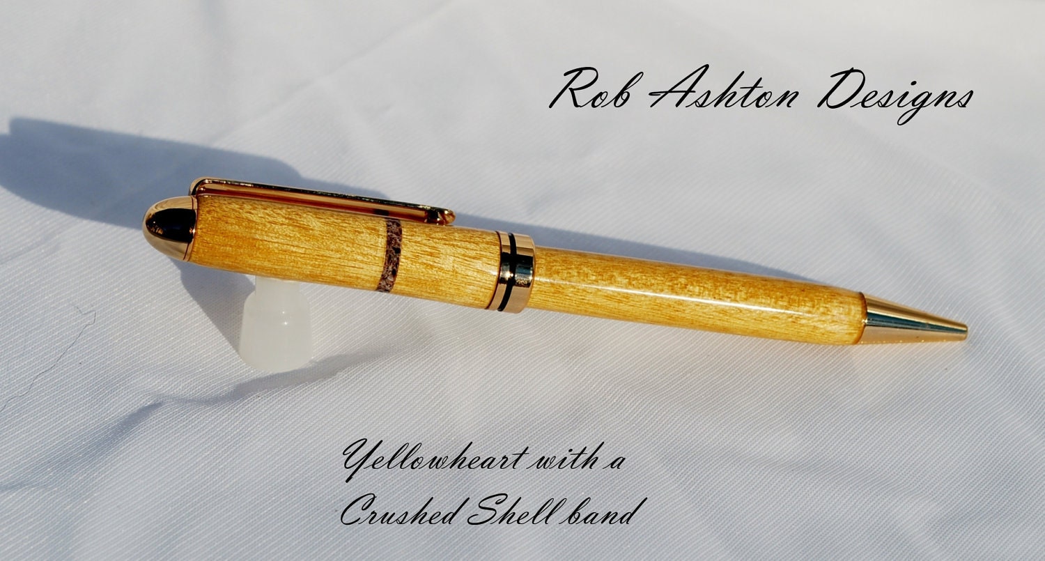 Yellowheart designer pen with crushed sea shell band