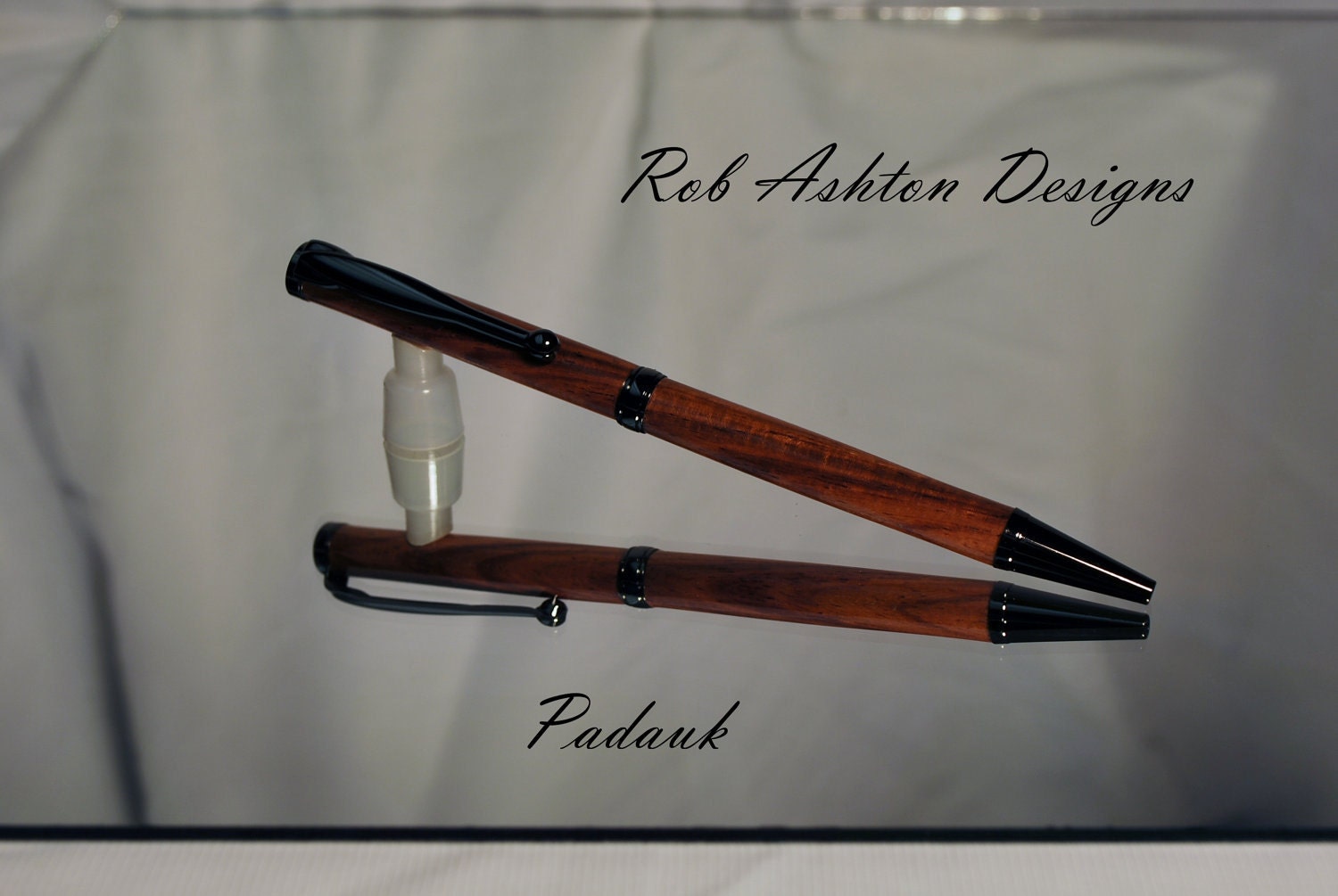 Slimline Padauk ballpoint pen trimmed with black titanium finish