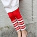 Red Leggings with Red and White Striped Ruffles