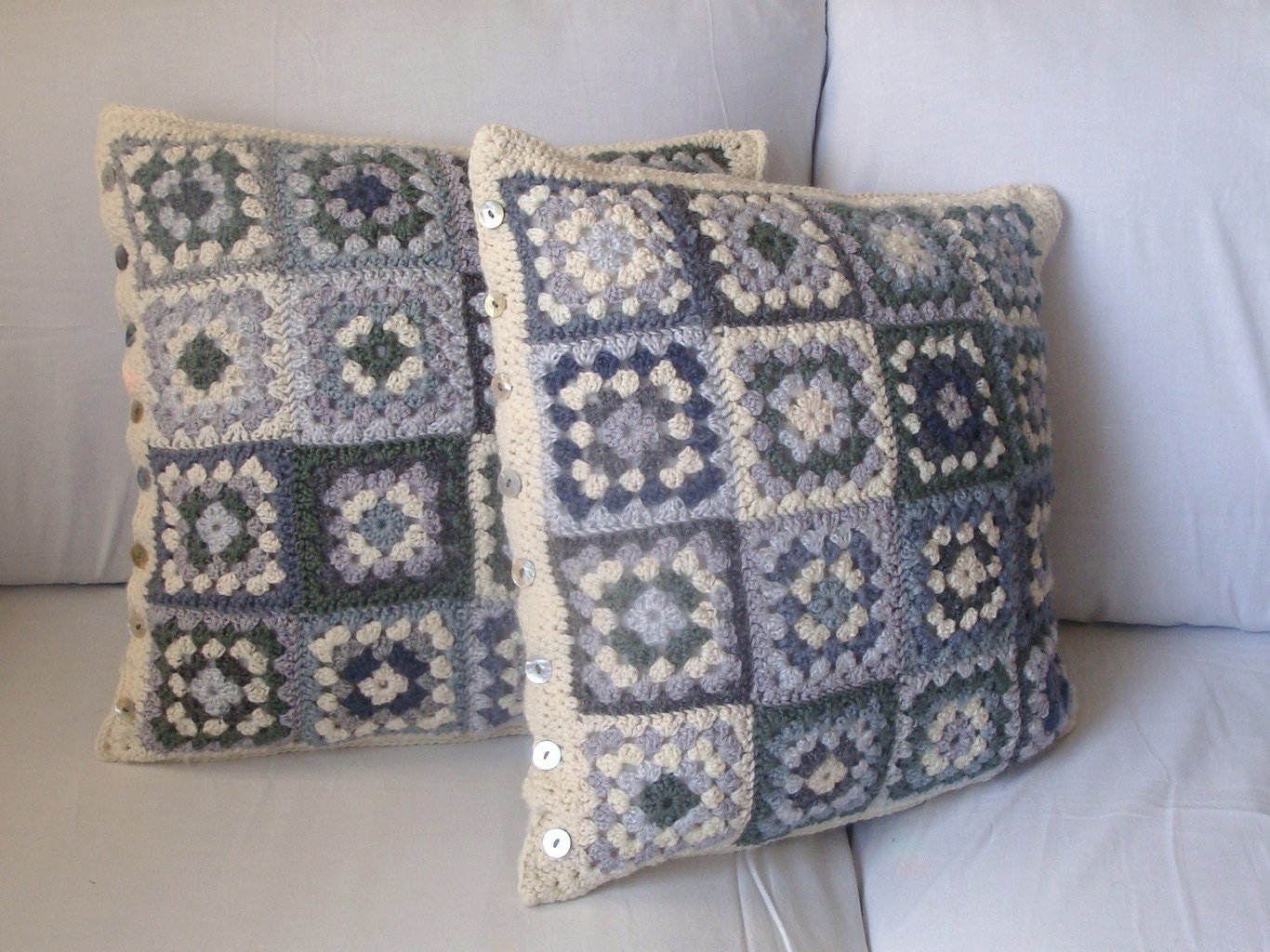Grey Scale Granny Square cushion cover, varying shades of grey with a cream boarder.