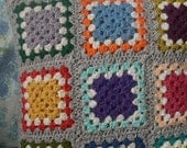 Granny Square Cushion Cover, crochet granny squares multicoloured with grey background and white highlight