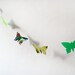 Green paper butterflies garland - wall decor