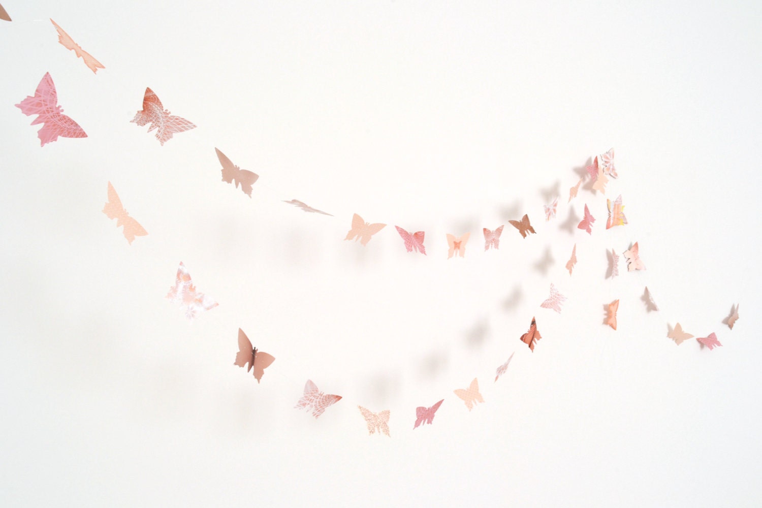 Peach and antique pink paper butterflies garland - wall decor