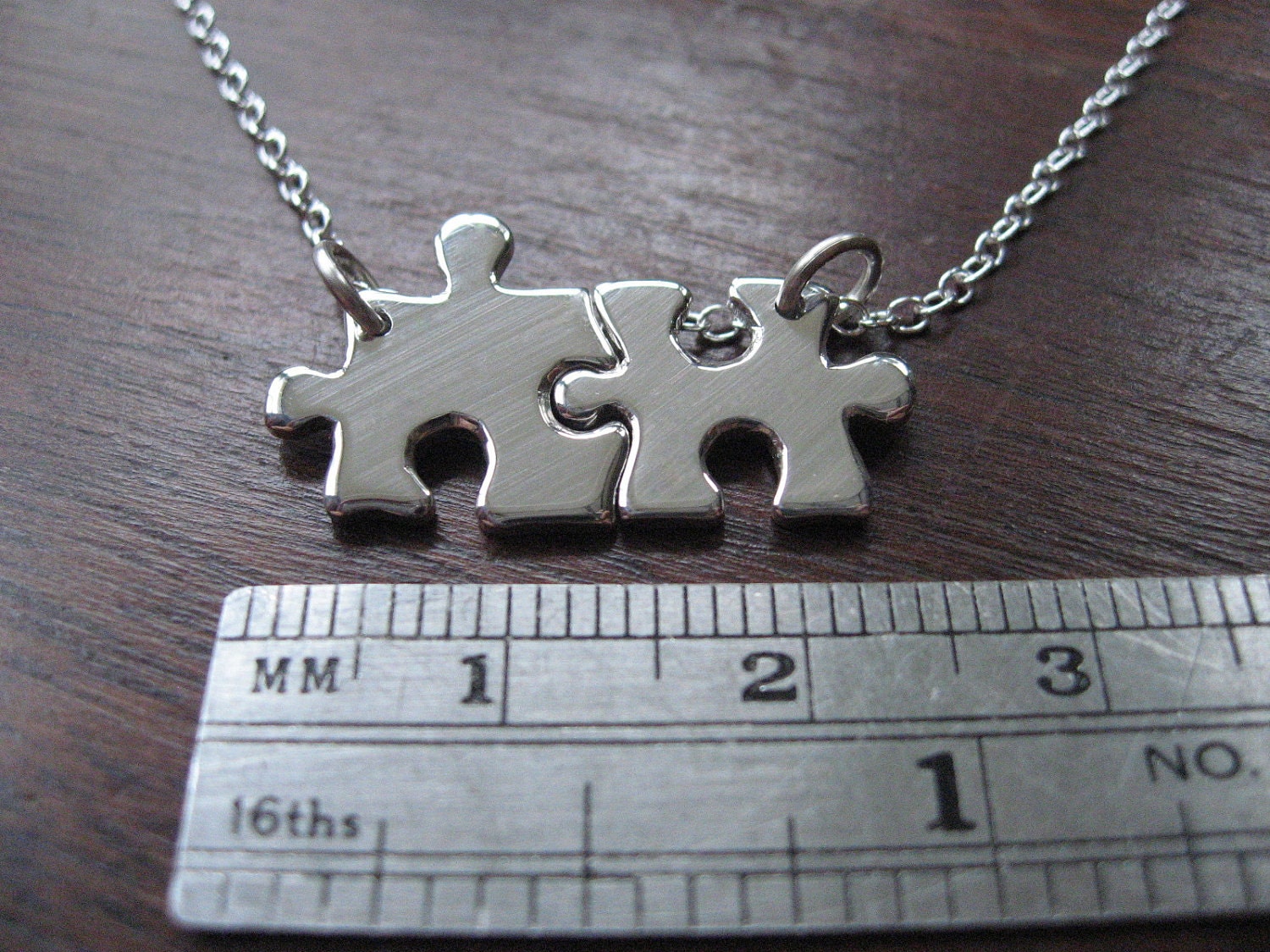 Two Miniature Puzzle Piece Pendants on one Necklace