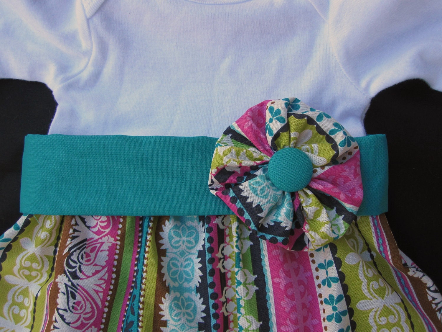 Multi Colored Striped Onesie Dress with Removable Belt and Fabric Flower
