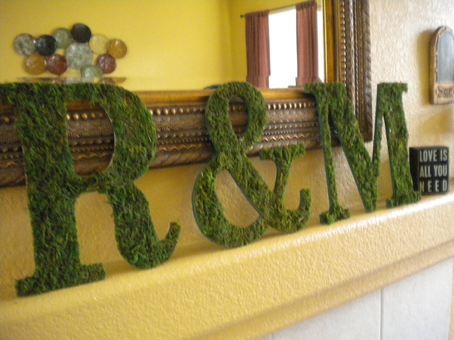 Two Moss Letters and an Ampersand