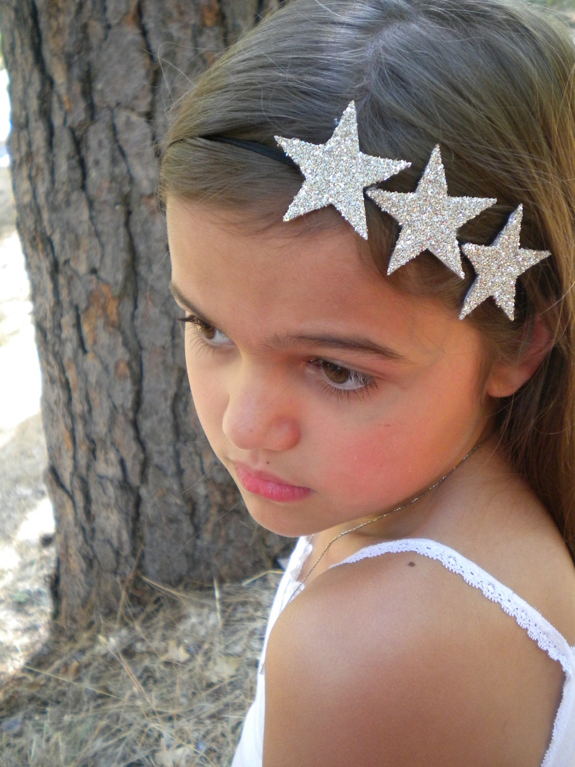 Silver Glitter Star Headband - three silver stars on a skinny black elastic headband