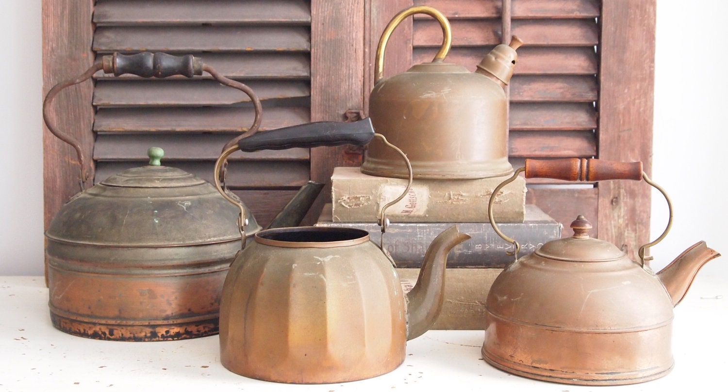 vintage collection of copper tea kettles/pots