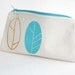 Spring pencil pouch screen printed in orange and turquoise