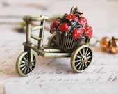 A cart full of roses - a vintage charm necklace