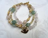 multi strand boho chic bracelet with peace dove rose quartz, shells, green aventurine and new jade