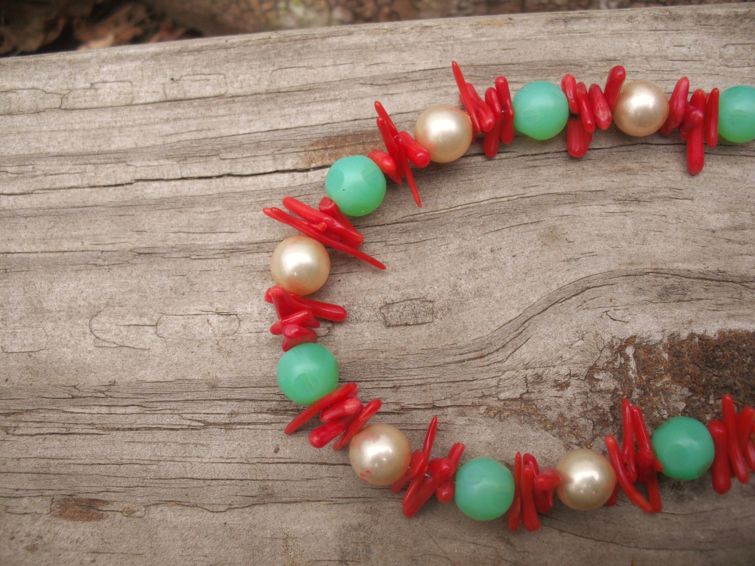 Elegant pearl, green and red hand beaded necklace