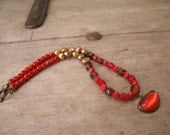 Beautiful hand beaded red glass, freshwater pearl and red pendant necklace