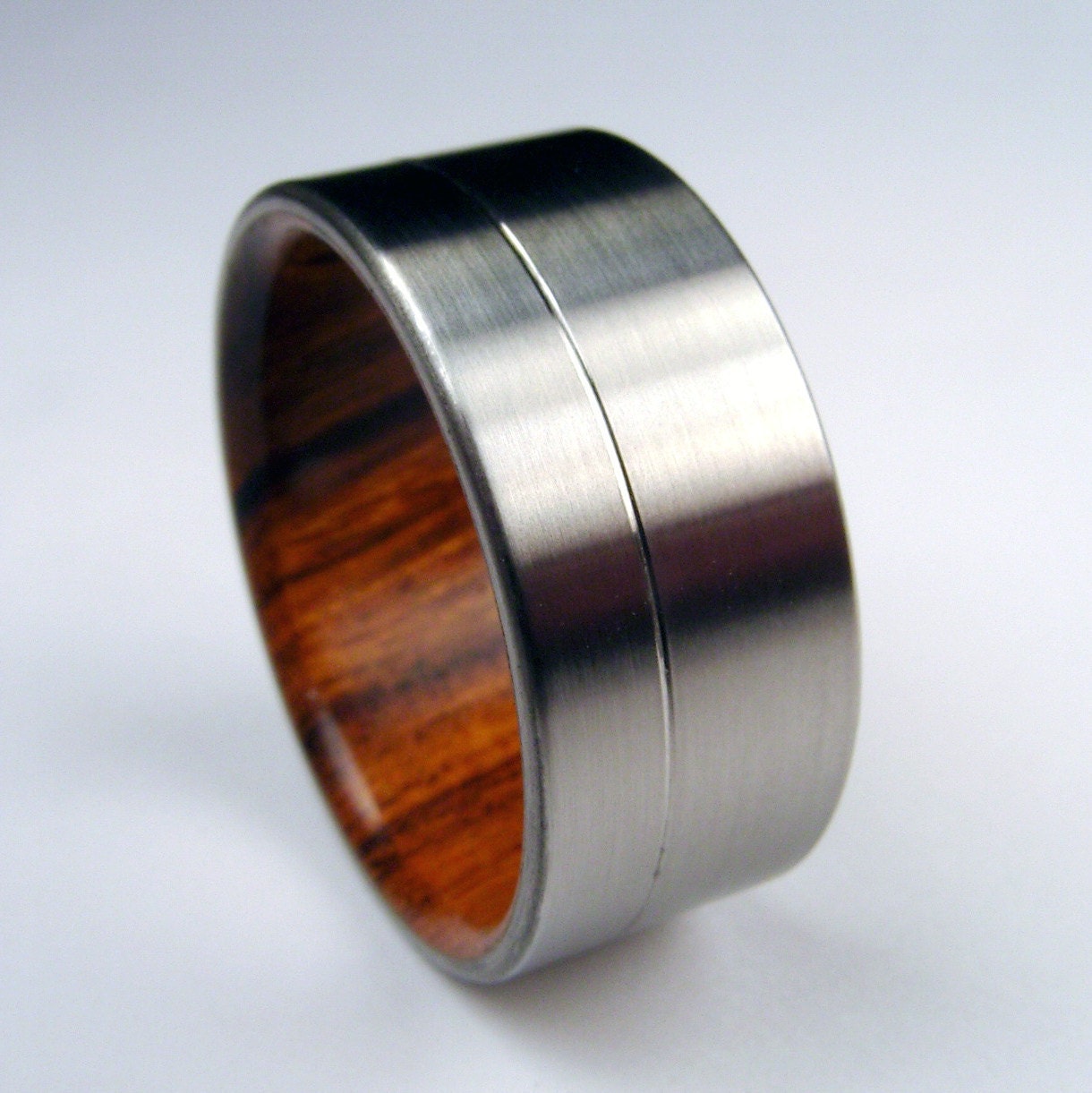 Wood and Titanium ring -- Rosewood interior and Titanium exterior with pinstripe