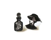shrink plastic victorian woman with hat and queen mary parfume