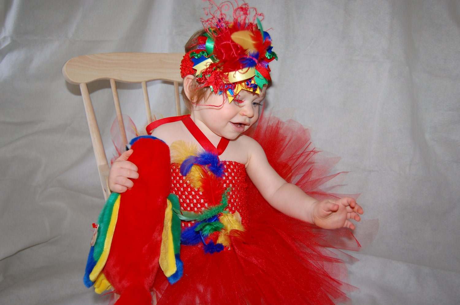 Parrot Costume set: Parrot themed Over the Top Hair Bow, Bright Red Tutu Halter Dress with tulle "tail feathers"