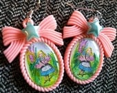 SALE Alice holding PIG in Wonderland Earrings: John Tenniel Illustrations, hand colored, PINK cameo, resin cap, teal star embellishments