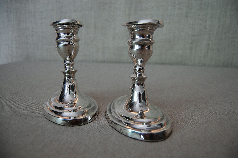 vintage oval base pair of silver candlesticks