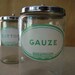 vintage medical or apothecary cotton and gauze glass jars
