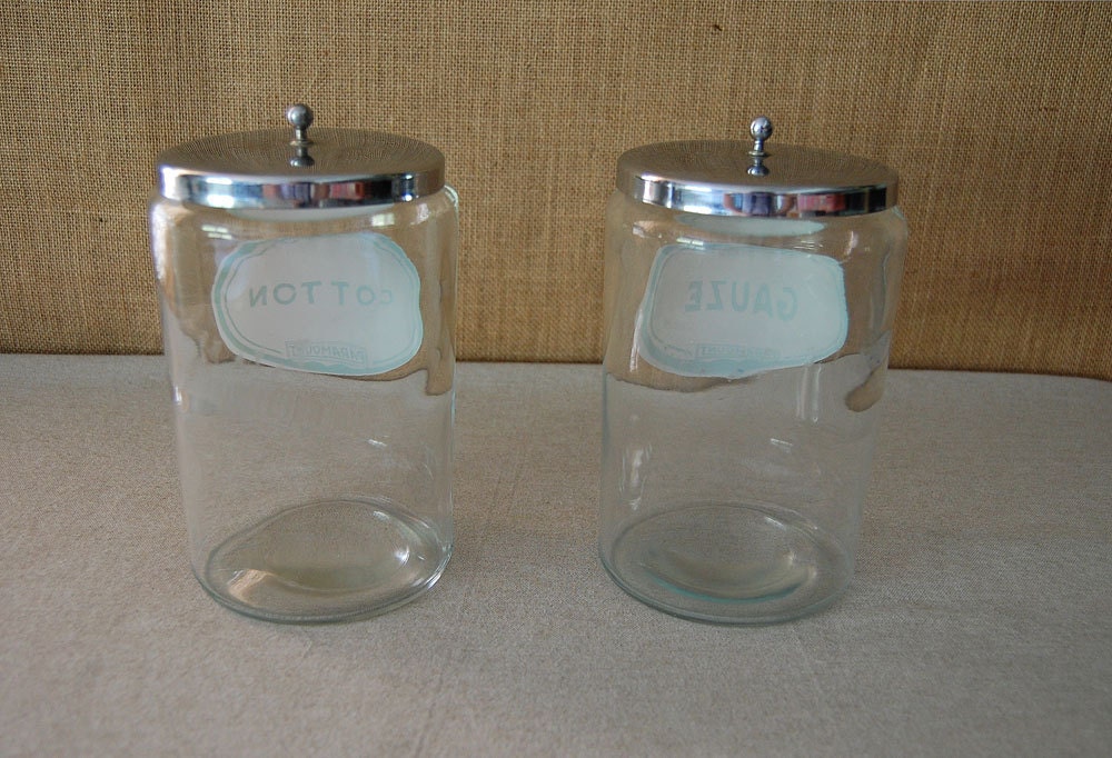 vintage medical or apothecary cotton and gauze glass jars