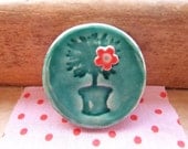 Bay tree brooch, turquoise crackle glaze with little red flower, teal, ultramarine