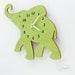 The "Baby Lime Green Elephant" designer wall mounted clock from LeLuni