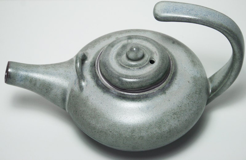 Floating handle teapot in two tone green