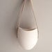 Set of 3 porcelain and leather hanging containers