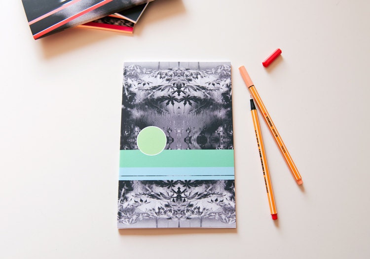 Notebook, A5 sized, green circle and geometric shapes with greenhouse photo cover, perfect bound