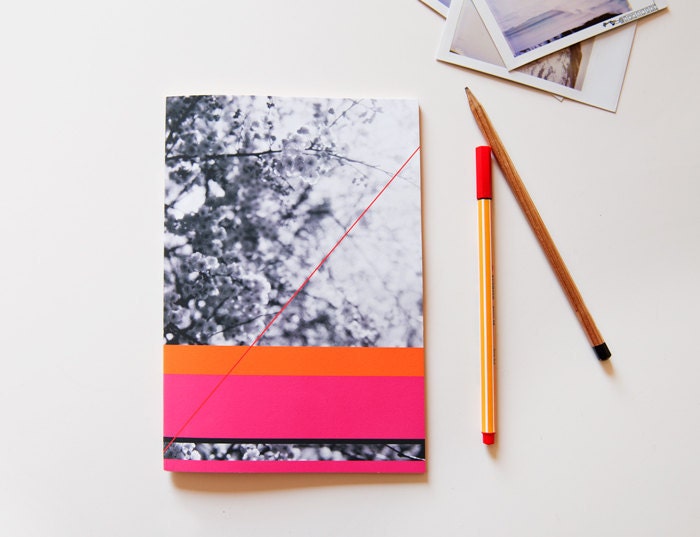 Notebook, A5 sized, pink and orange, geometric shapes and flower photo cover, perfect bound