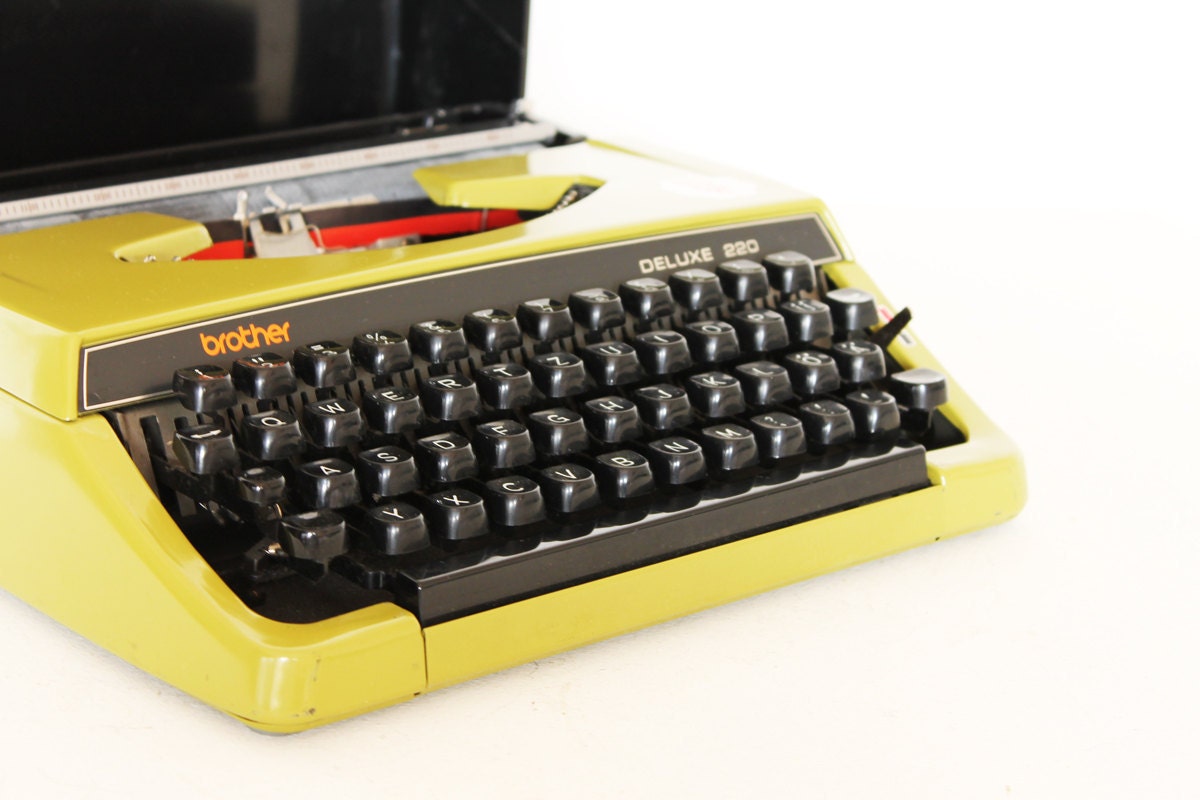 Vintage manual green deluxe typewriter