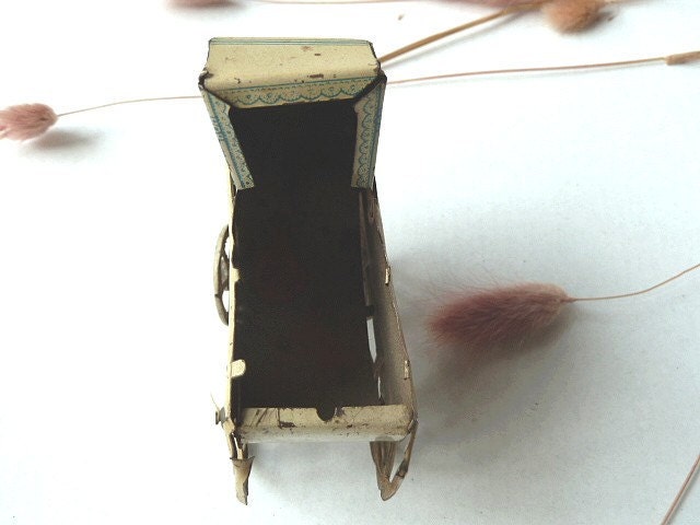 Antique french doll baby cradle .  Tin Baby Carriage .Toy .1900s
