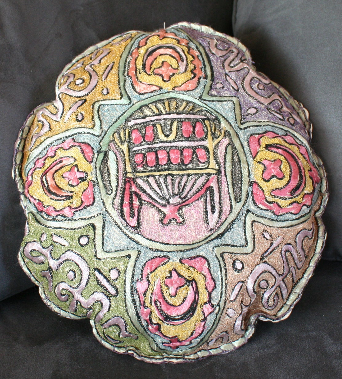Middle Eastern embroidered oval pillow