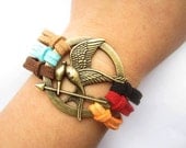 Mockingjay inspired Bracelet---antique bronze The hunger game style pendant & colorful rope chain