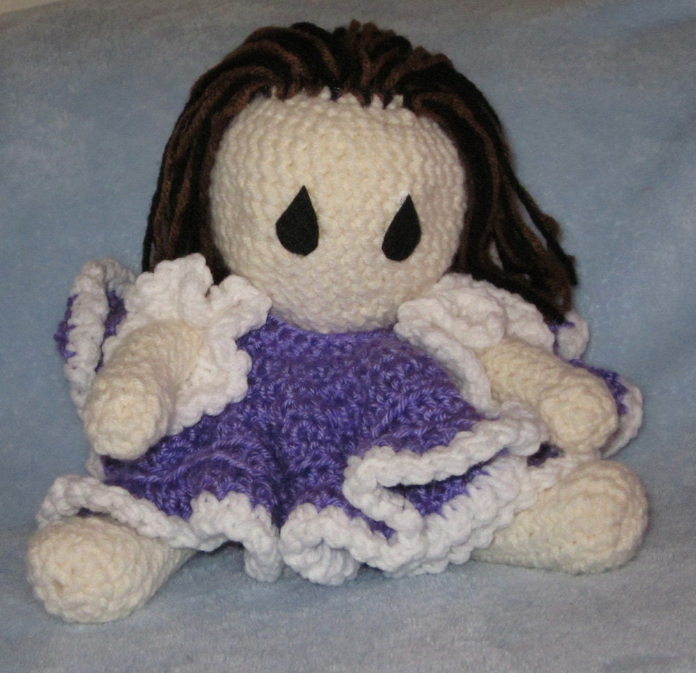 Sylvia handmade crochet amigurumi doll with purple dress and dark brown hair