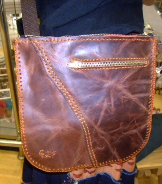 brown oiled leather messenger bag leather has 2 tone pattern and very ...