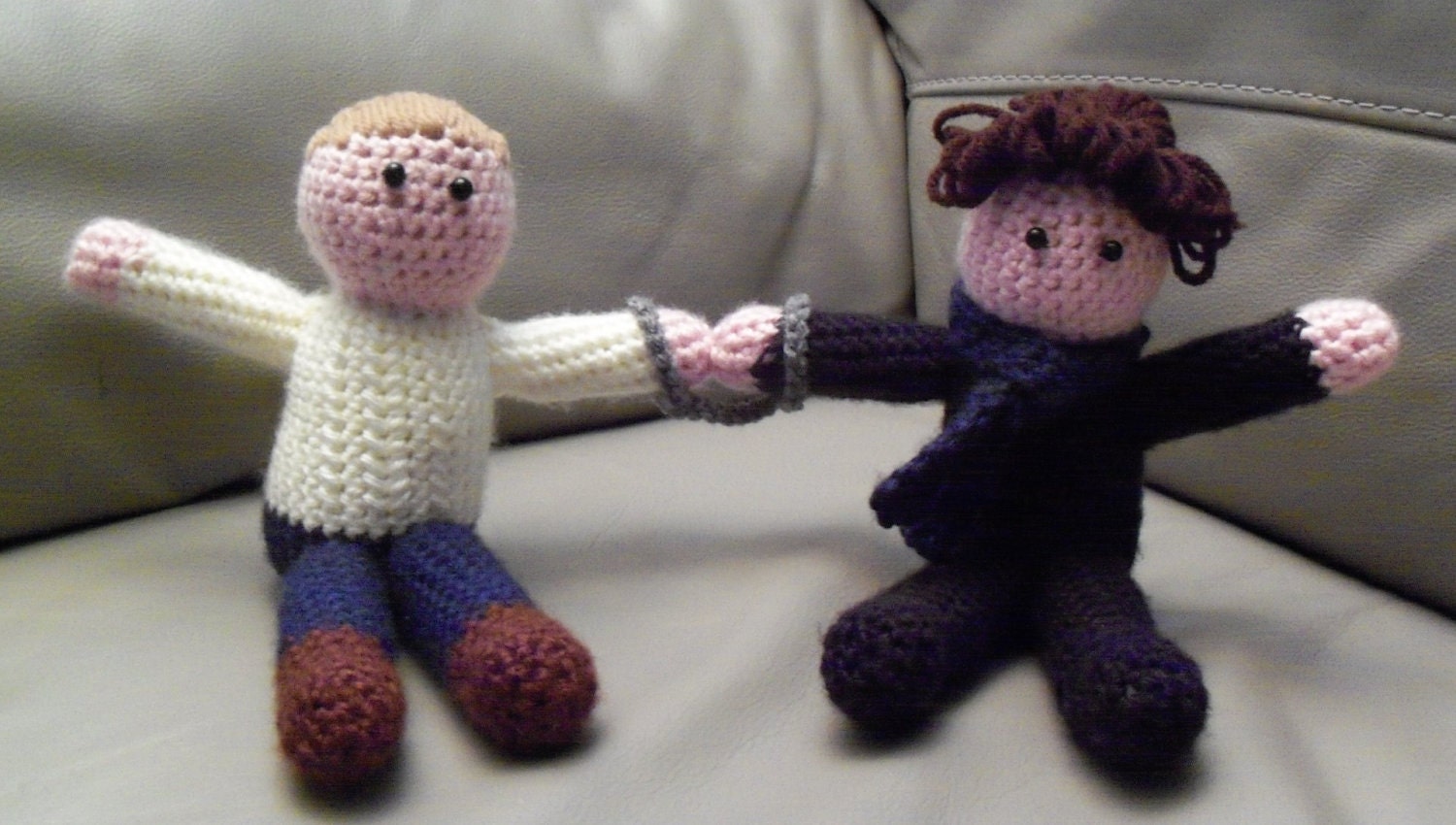 Handcuffed BBC Sherlock and John crocheted dolls