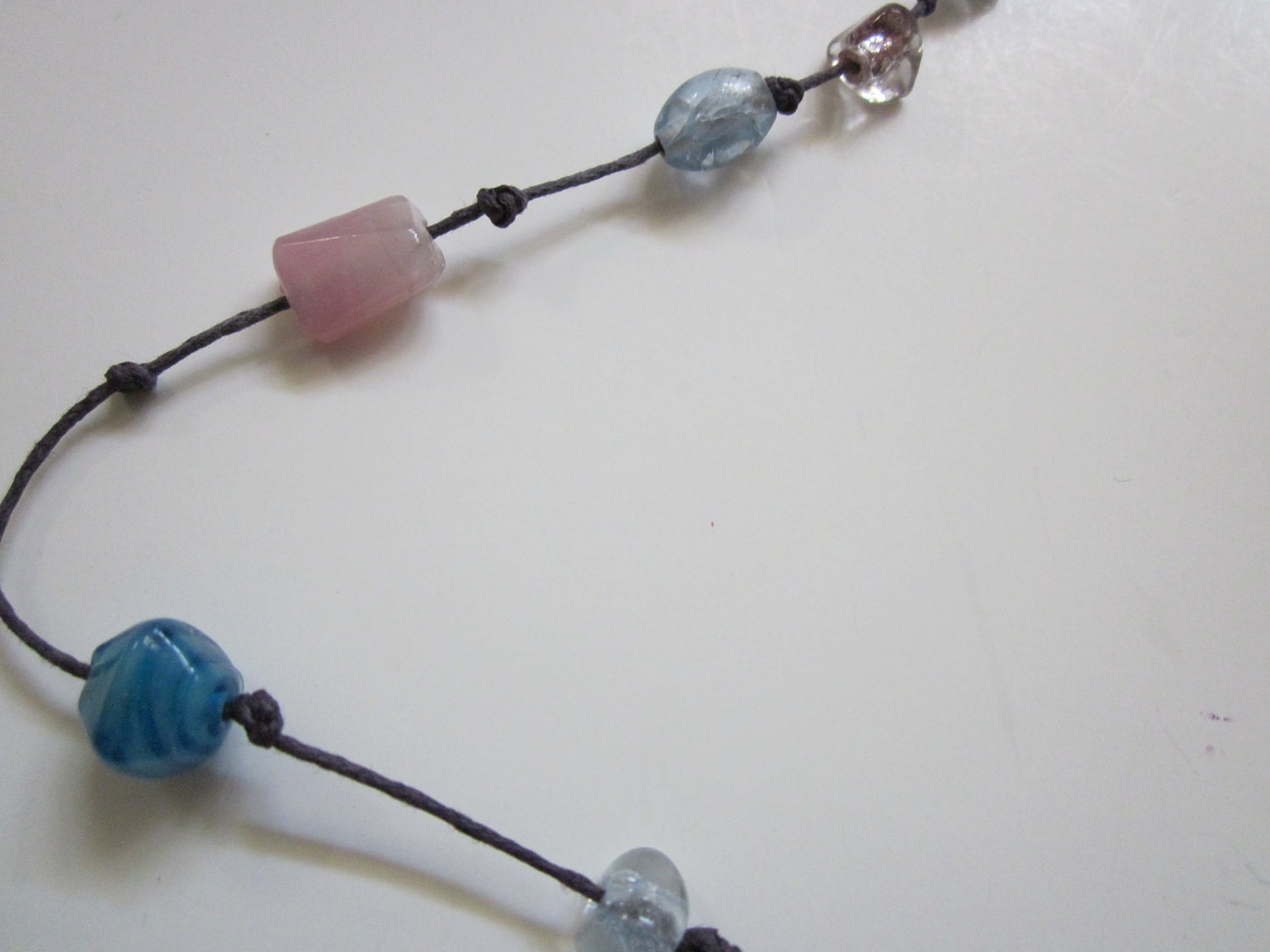 Discounted-Glass-Beaded Necklace on Purple Cord