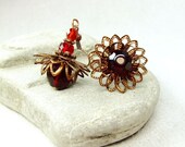 Red flower earrings.