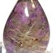 Rutilated Quartz on Sugilite Backer 22 carats 1 inch