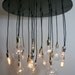 The Neely Round Industrial Chandelier with vintage bulbs