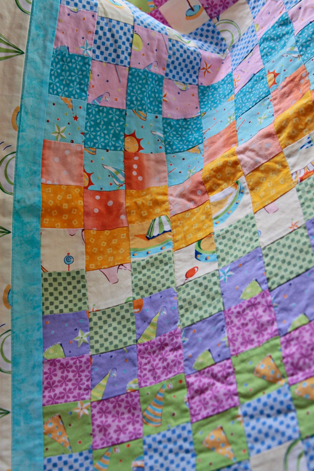 Handmade Baby Quilt in Circus Performers by Felicity Miller