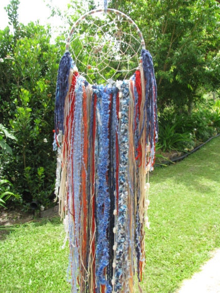 Dreamcatcher Wall Hanging - made with yarn and the colours of a Desert Sunset rich blue and rust