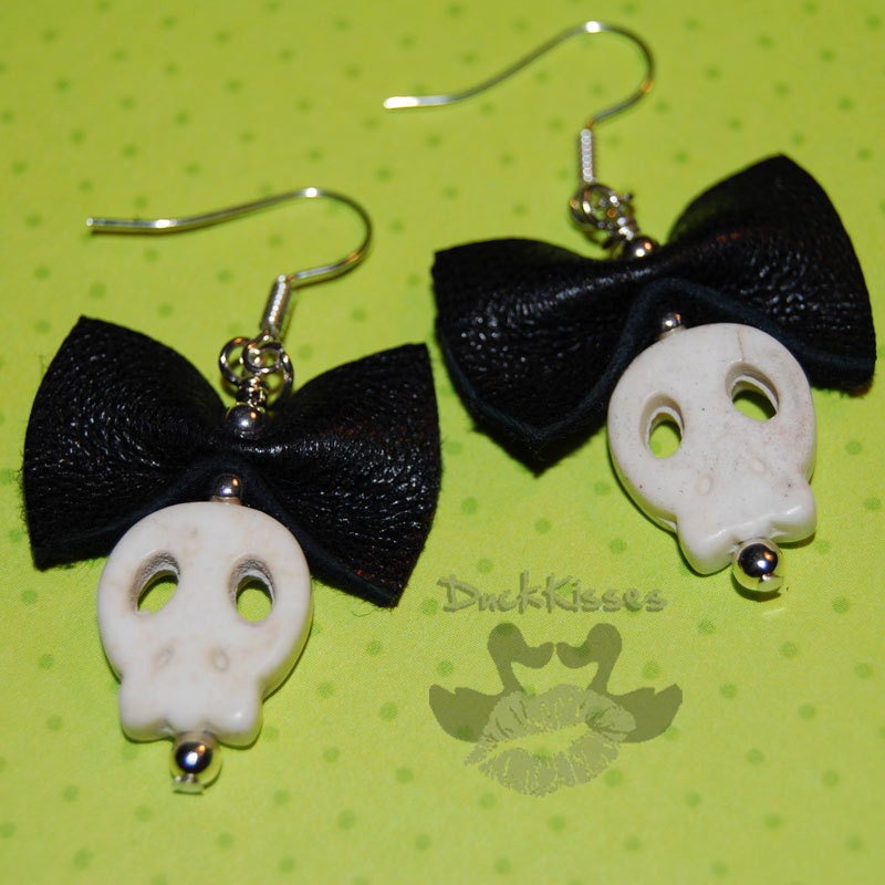 Dangling Flat Skulls with Leather Bows Earrings