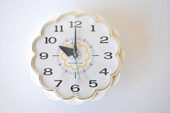 Vintage wall clock, white with scalloped edges and aqua blue second hand