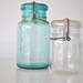 Ball aqua blue mason jar and Atlas brand clear jar EZ Seal